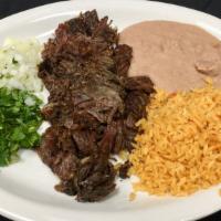 Barbacoa Plate · Mexican style cheek meat. Served every day savory cheek meat cooked to perfection. Served wi...