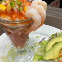 Shrimp Cocktail · Home made shrimp cocktail topped with pico de gallo and avocado. Comes with crackers.