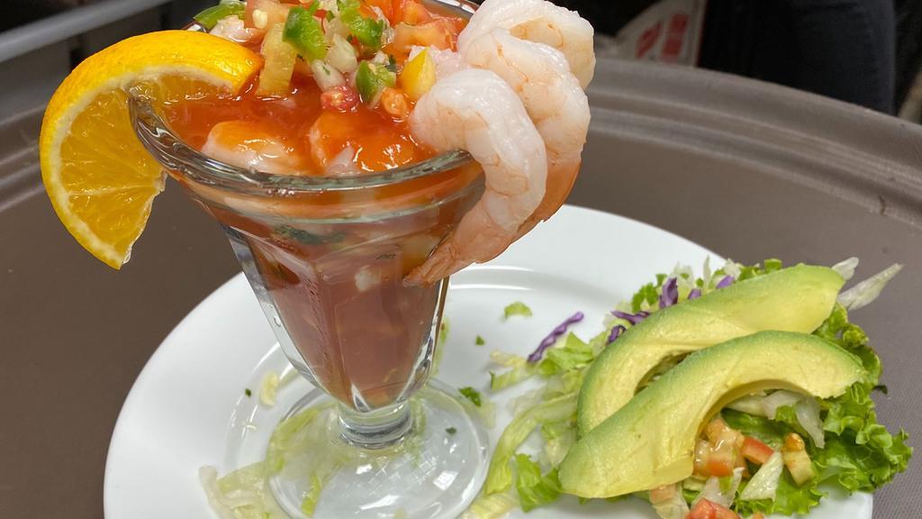 Shrimp Cocktail · Home made shrimp cocktail topped with pico de gallo and avocado. Comes with crackers.