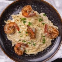 Alfredo · Creamy made to order Alfredo sauce tossed in fettuccine noodles