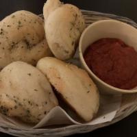 Basket Of Garlic Rolls · Four garlic rolls w/ marinara