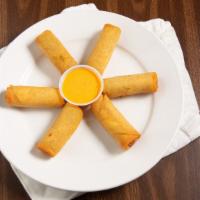 Thai Spring Rolls (6) · Chicken, veggies, and cashews in a crispy
spring roll wrapper served with red bell
pepper sa...