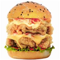 Double Chicken Sandwich · Delicious sandwich made with 2x the Fried chicken, lettuce, pickles, tomatoes, sriracha, and...