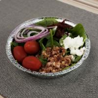 Spinach Salad · Baby spinach, goat cheese, red onion, tomatoes, bacon, sun dried tomatoes, and choice of dre...