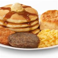 The Sunshine Platter · Four hotcakes with syrup, scrambled eggs, hash brown, sausage patty and a biscuit.