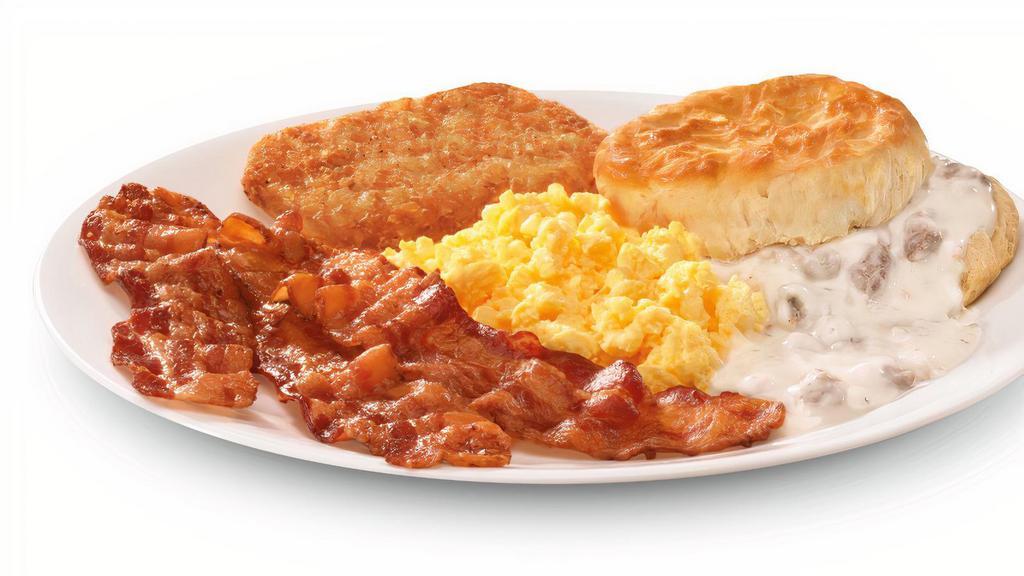 Scrambled Eggs Breakfast · Scrambled eggs with your choice of one meat (three-pieces of bacon, sausage patty, or breakfast steak), hash brown, and a biscuit with sausage gravy.