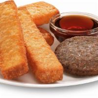 4 French Toast Sticks With Sausage Links · Four French toast stix with two syrup and sausage patty.