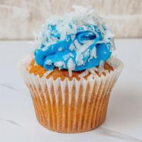 Blue Coconut · Incredible and Moist, coconut cream cupcake with a crazy good blue coconut buttercream frost...