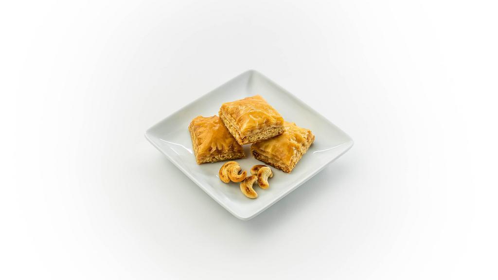 Classic Cashew Baklava · Per Piece: Golden crispy filo dough sheets with cashew mixture inside