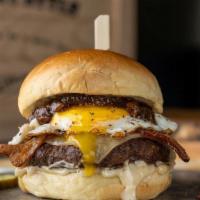 Bacon, Egg & Cheese Burger · lou's custom blend burger, white cheddar, bacon jam, candied bacon, fried egg, garlic aioli ...