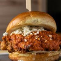 Buffalo Chicken Sandwich · hand-breaded fried chicken breast, classic buffalo sauce, blue cheese crumbles, house ranch,...