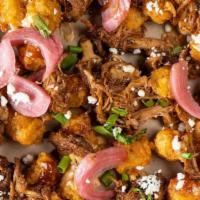 Loaded Bbq Tots · large order of sweet potato tots, pulled pork, bbq sauce, queso, pickled red onions, queso f...