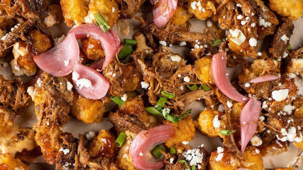 Loaded Bbq Tots · large order of sweet potato tots, pulled pork, bbq sauce, queso, pickled red onions, queso fresco, scallions.