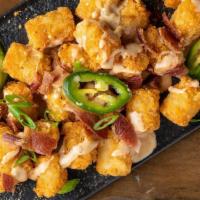 Loaded Tots · queso, bacon, jalapeno, scallions
