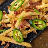 Regular Loaded Fries · queso, bacon, jalapeno, scallions.