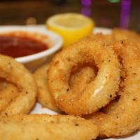 Calamari Fritti · Slightly breaded and fried to golden brown served with marinara sauce.