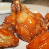 Italian Buffalo Wings (6 Pc) · Coated with homemade parmigiana garlic sauce served with ranch or blue cheese.