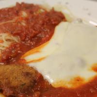 Chicken Parmigiana · Lightly breaded chicken breast topped with mozzarella cheese and marinara sauce.