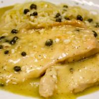 Chicken Piccata · Sautéed chicken breast in a lemon-butter white wine sauce with capers.