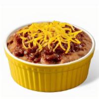 Party Beans · Refried beans, chili sauce, and cheddar