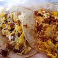 Breakfast Tacos · Flour or corn tortilla, egg and your choice of potato, ham, bacon, cactus, chorizo or cheese.