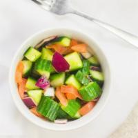 Cucumber Salad · Cucumber, Tomato, Onions,  Lighted seasoned