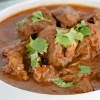 Beef Curry · Traditional dish, slow cooked, tomato, green, chili, cilantro