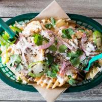 Cantina Fries · waffle fries · carne asada · queso · pickled red onion ·  lime sour cream · jalapeño · cilan...