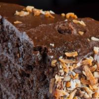 Chocolate Ganache Cake Slice · 6 layers of moist chocolate cake with chocolate ganache