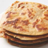 Plain Paratha · A layered flatbread made with flour, salt, water and ghee (Oil). Our plain paratha's are mad...