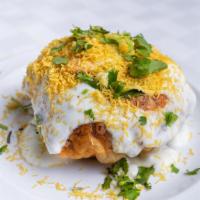 Raj Kachori · Spicy and tangy chaat bowl stuffed with potato and chickpeas filling served with sweet yogur...