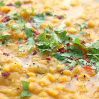 Dal Tadka · Multiple types of yellow lentils cooked our way with a special blend of Indian spices and he...