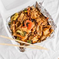 Pad Kee Mow · Spicy Stir fried wide flat rice noodle with egg, bell peppers, bail, tomato, onion, carrots ...