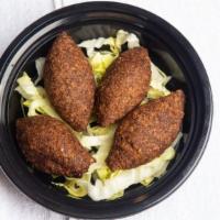 Kibbeh · A serving of 4 traditional Lebanese ground beef combined with bulgur wheat, onion, and mixed...