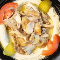 Hummus With Chicken Shawarma · A smooth thick mixture of mashed chickpeas, tahini, oil, lemon juice, and garlic topped with...