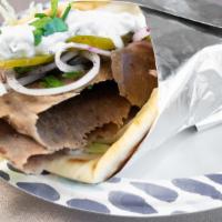 Gyro Sandwich  · Gyro meat , onion, Lettuce, tomatoes Tzatziki sauce, on gyro bread