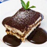 Tiramisu · Layers of cookies, soaked in espresso coffee, with a rich sweet mascarpone cheese, topped wi...