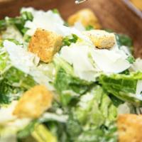 Caesar Salad · Chopped romaine lettuce ,tossed with our homemade Caesar dressing, parmesan cheese and crout...