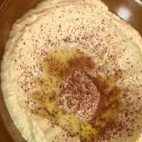 Hummus · A savory chickpea dip made with garlic, tahini sauce (sesame paste), and lemon juice. Served...
