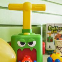 Monster Balloon Powered Cars · Blow up balloon and watch the air powered car zip across the floor.