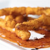 Giant Calamari · Crisped with chile sweet and spicy sauce.