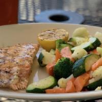 Grilled Salmon · Served with soup or house salad.