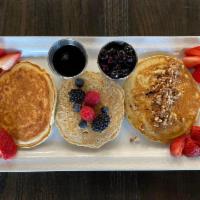 Pancake Flight · One of each of our three pancakes, served with blueberry compote and pure maple syrup