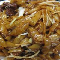 Beef Flat Noodle/干炒牛河 · Sliced beef sautéed with Bean sprouts, Onion and Scallions.