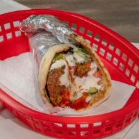 Falafel Wrap · Mixed vegetables and special spices combined to create a delicious deep fried veggie balls m...