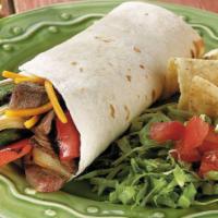 Beef Kebab Wrap · Marinated beef cubes grilled and wrapped in a pita bread with lettuce, tomato, cucumber, oni...