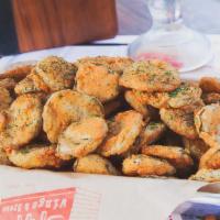 Fried Pickle Caps · Fried hand battered kosher pickle caps. All of our appetizers are handmade with a unique ble...