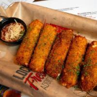 Cheese Sticks · Hand breaded Mozzarella sticks served with marinara sauce. All of our appetizers are handmad...