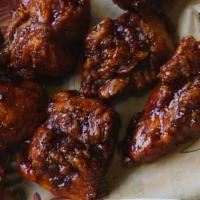 20 Wings · Choice of two wing sauces. Dipping sauces are an additional charge.