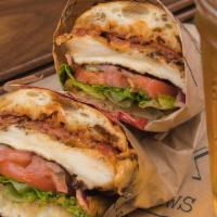 Chicken Chipotle Sandwich · Grilled chicken breast, Cheddar, applewood bacon, chipotle mayo ,lettuce, tomato, onion, on ...